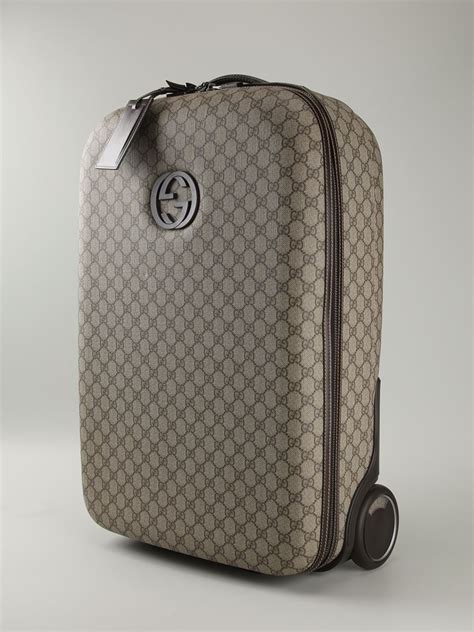 gucci hand carry luggage.